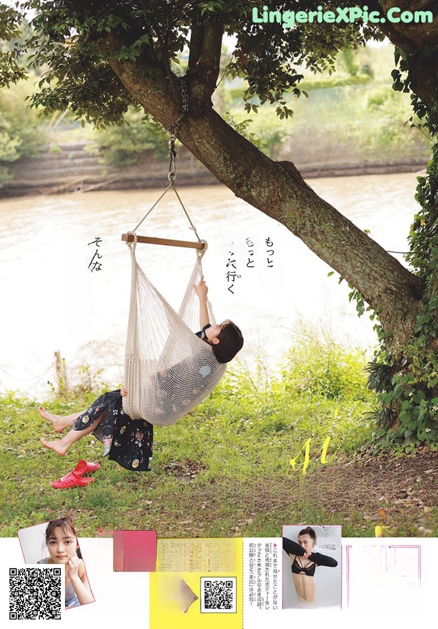 A woman laying in a hammock hanging from a tree.